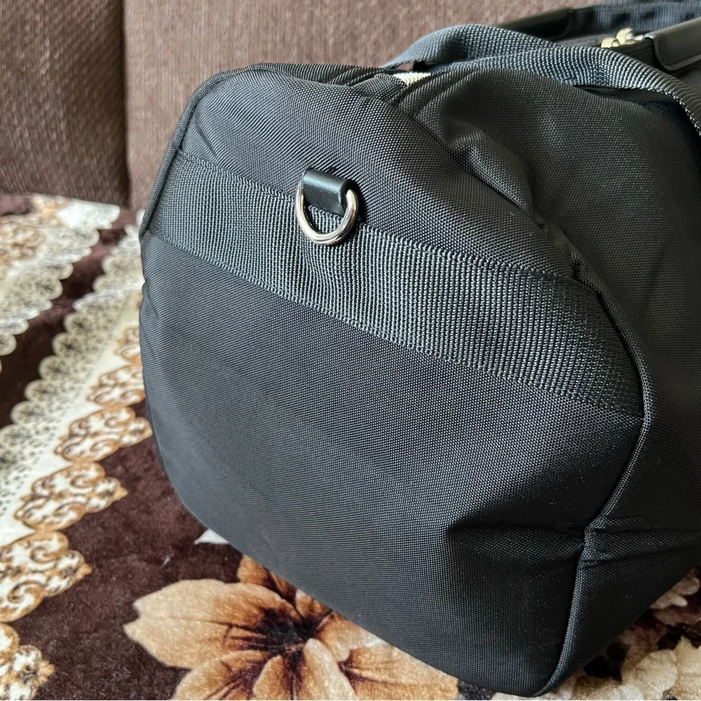 MICHAEL KORS Black Barrel Nylon Detachable Strap Silver-Tone Hardware Duffle Bag